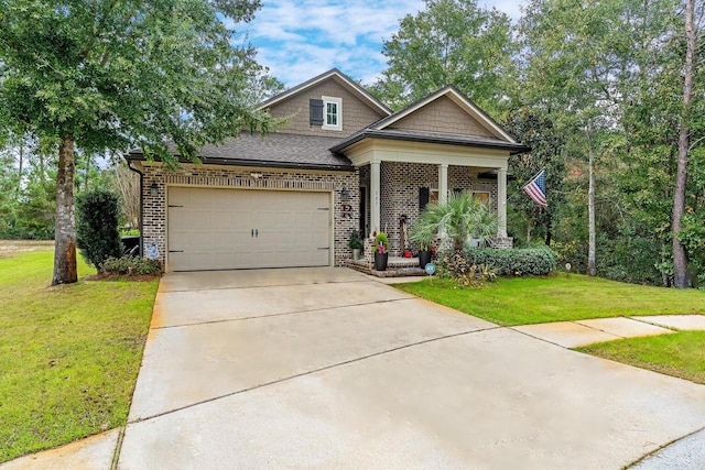 craftsman inspired home featuring a front yard and a garage