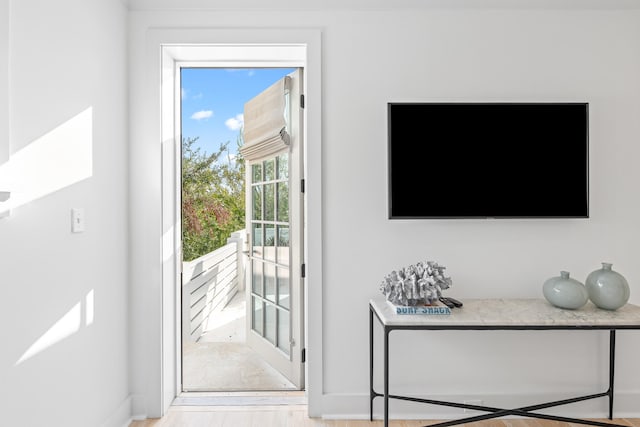 entryway with light hardwood / wood-style floors