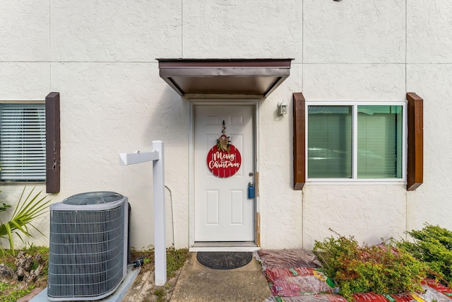 property entrance with central air condition unit