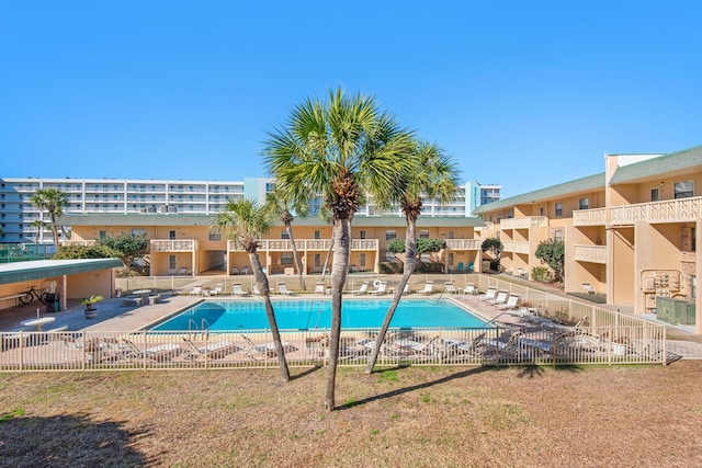 view of swimming pool featuring a patio area