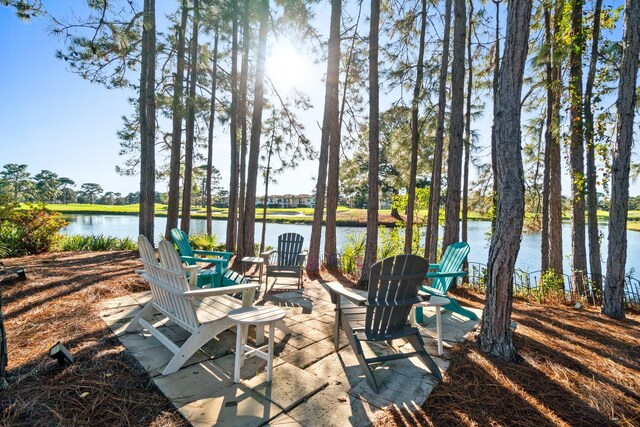 view of patio featuring a water view