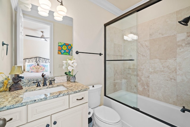 full bathroom with ceiling fan, enclosed tub / shower combo, toilet, vanity, and ornamental molding