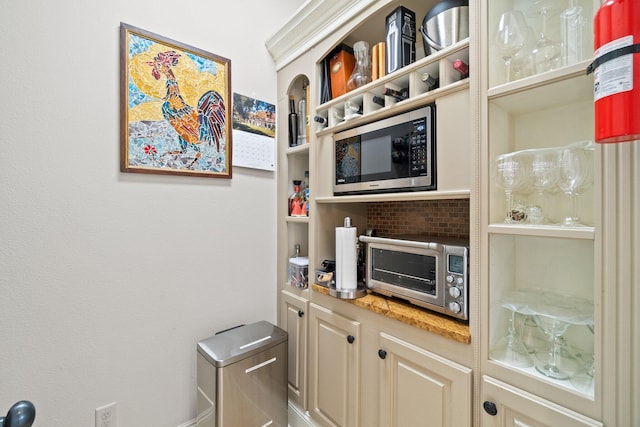 kitchen featuring cream cabinetry