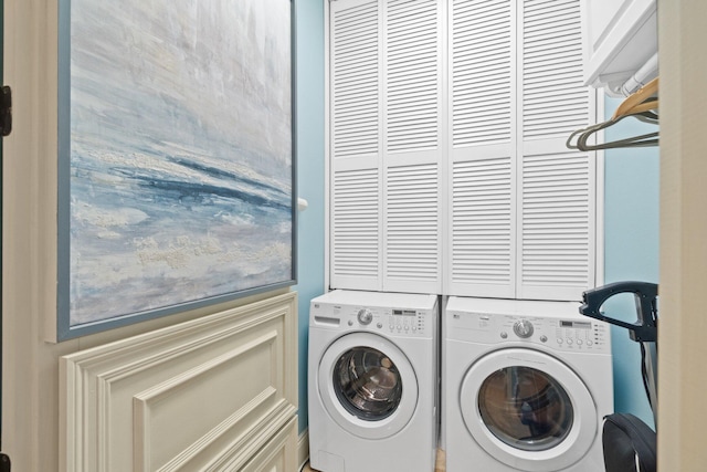 laundry room with washer and dryer