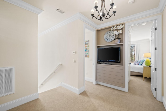 interior space with crown molding and a chandelier