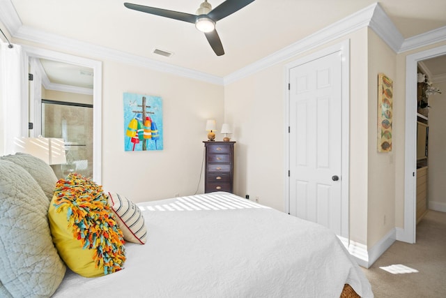 bedroom featuring carpet flooring, ceiling fan, crown molding, and a closet