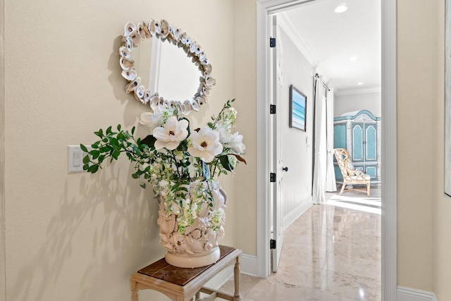 hallway featuring crown molding