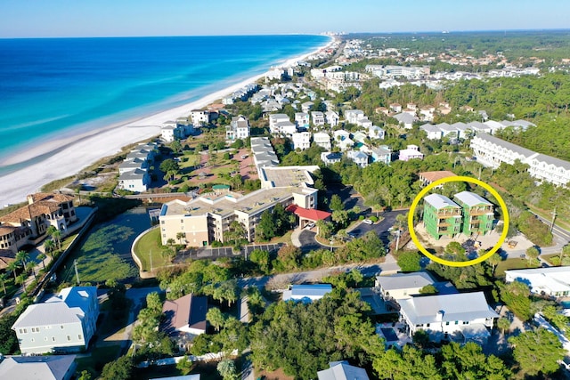 bird's eye view with a view of the beach and a water view