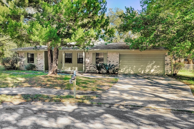 ranch-style house featuring a garage