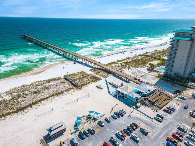 aerial view featuring a water view and a beach view