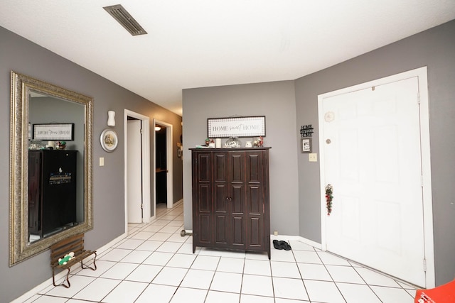 view of tiled entrance foyer