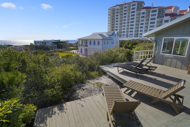 wooden terrace with a water view