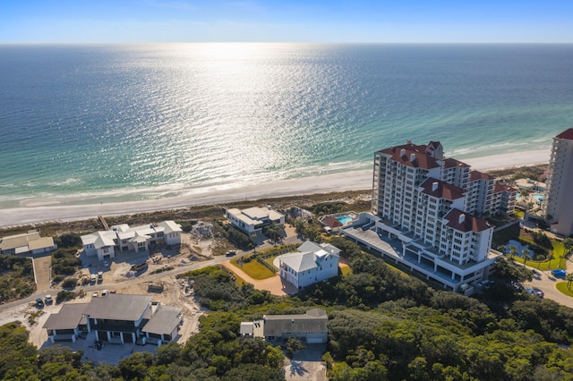 drone / aerial view with a view of the beach and a water view