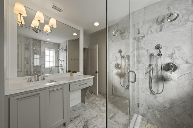 bathroom featuring vanity and walk in shower