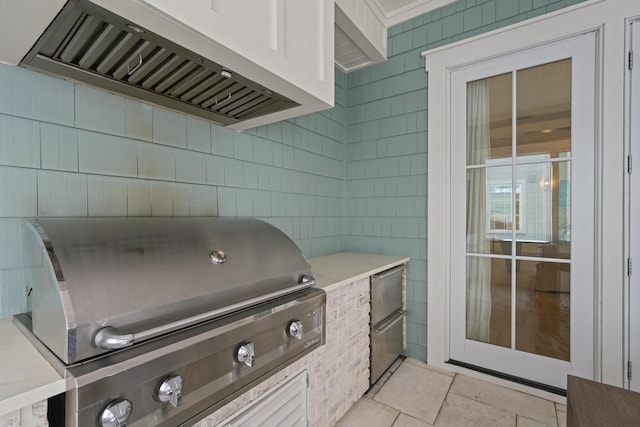 view of patio featuring exterior kitchen and grilling area