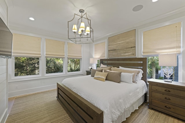 bedroom with a chandelier