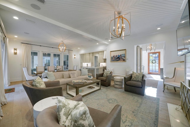 living room featuring light wood-type flooring and wood ceiling