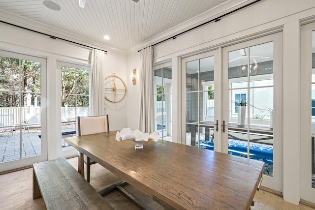 dining room with recessed lighting, light wood-type flooring, a ceiling fan, and french doors