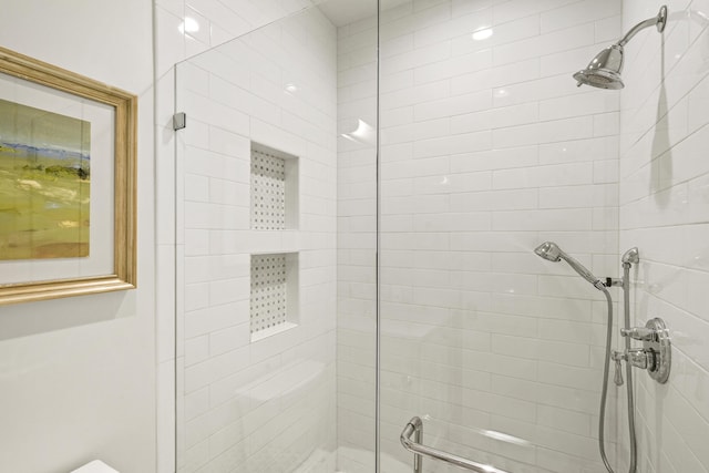 full bathroom with a shower stall
