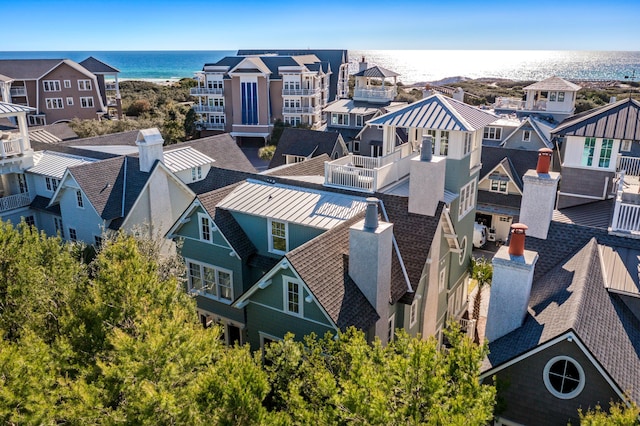 birds eye view of property featuring a residential view and a water view
