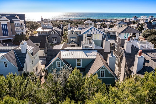 bird's eye view with a residential view and a water view