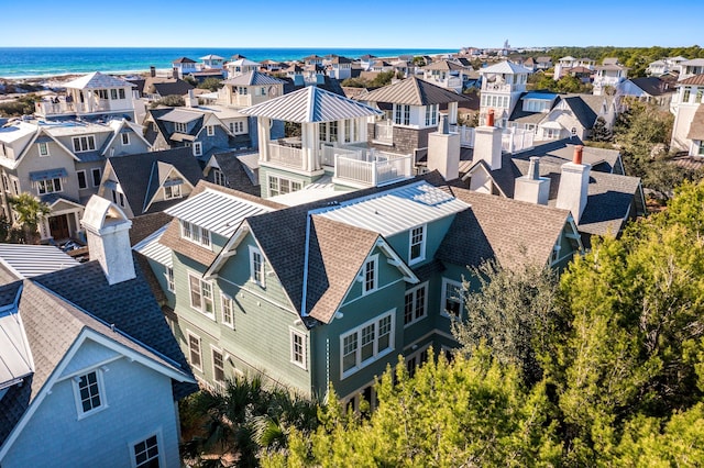 bird's eye view with a residential view and a water view