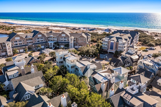 drone / aerial view with a view of the beach and a water view