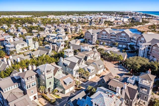 aerial view featuring a water view and a residential view
