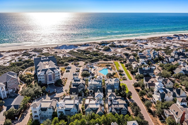 birds eye view of property with a residential view, a view of the beach, and a water view