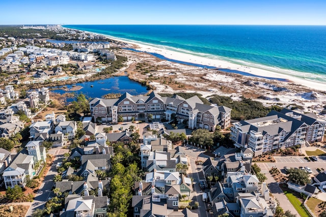 aerial view with a beach view and a water view