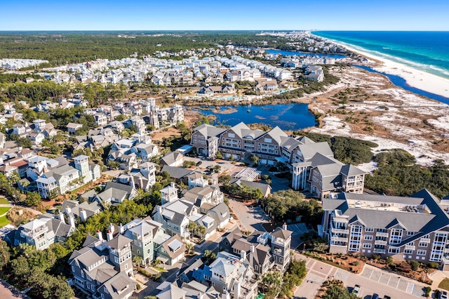 birds eye view of property with a residential view, a view of the beach, and a water view