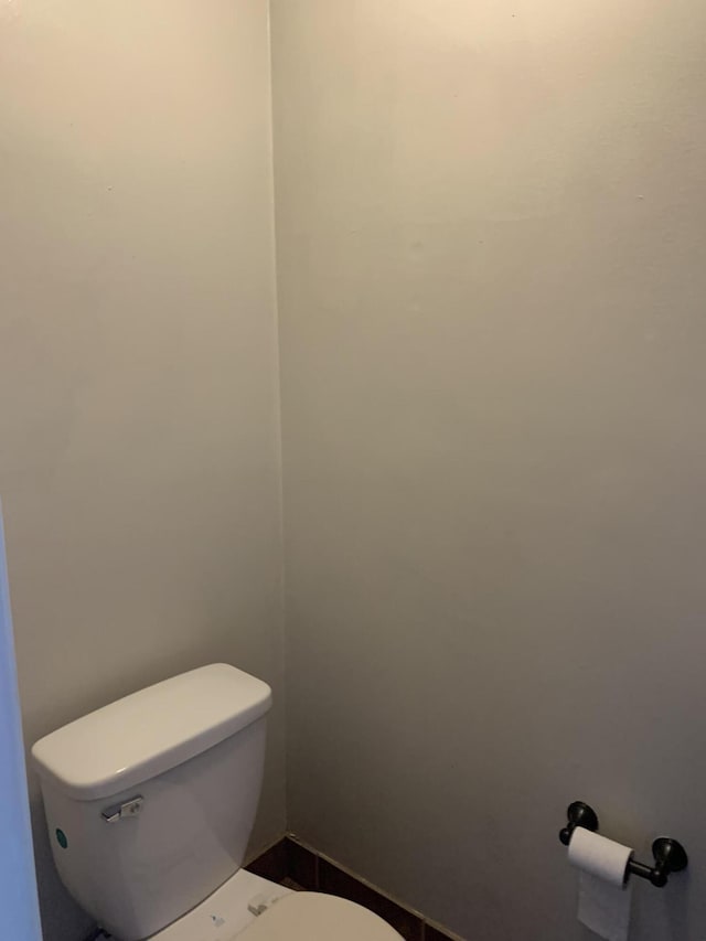 bathroom featuring toilet