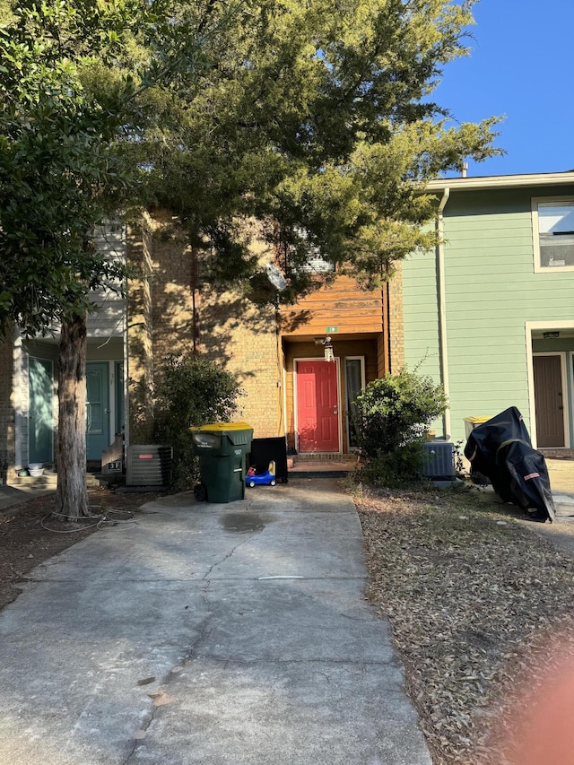 view of front of home featuring central AC unit