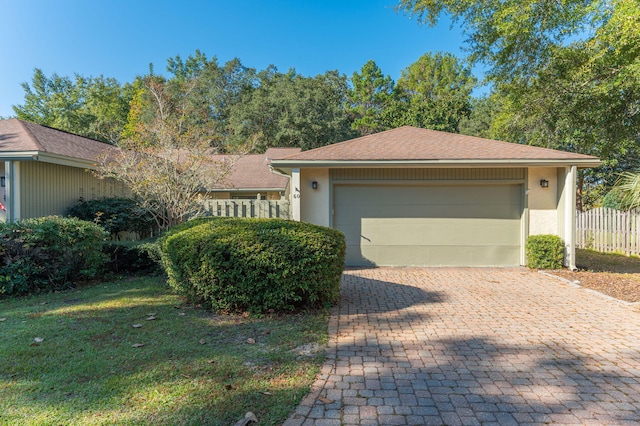 single story home with a garage