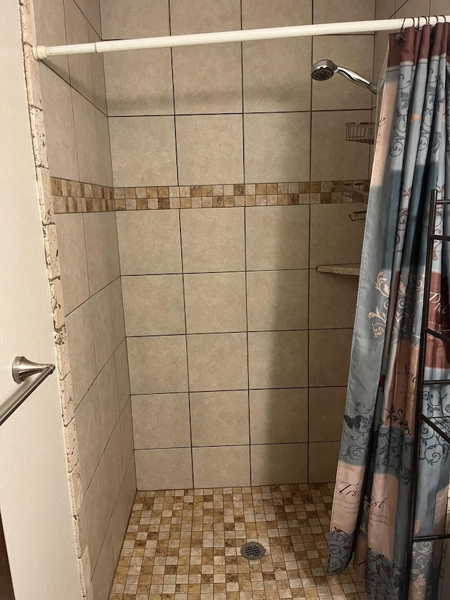 bathroom with a shower with shower curtain