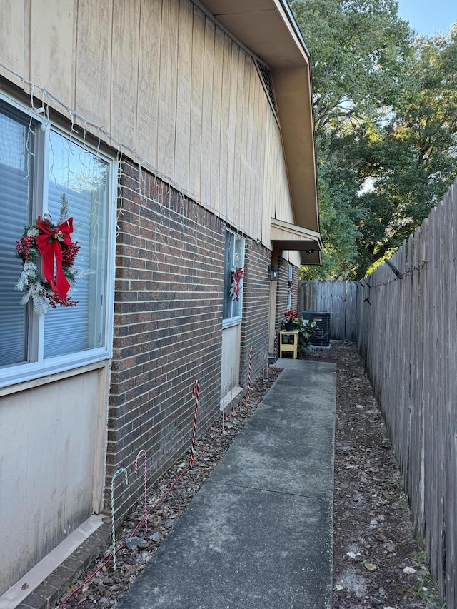 view of home's exterior featuring central AC