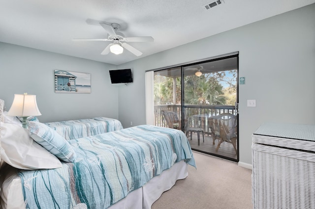 bedroom with ceiling fan, access to exterior, and light colored carpet