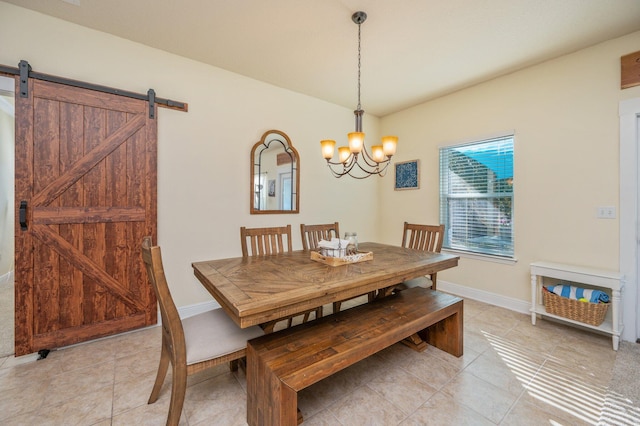 tiled dining area with a notable chandelier and a barn door