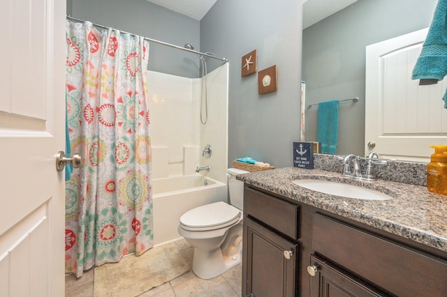 full bathroom with tile patterned floors, vanity, toilet, and shower / bath combo with shower curtain