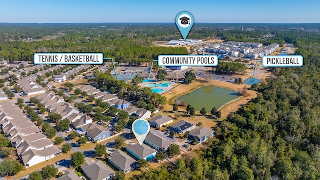 birds eye view of property featuring a water view