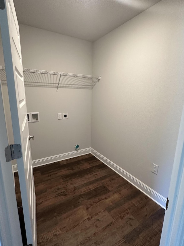 laundry room with hookup for a washing machine, dark wood-type flooring, and hookup for an electric dryer