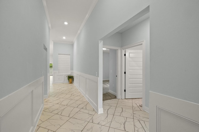 hallway featuring ornamental molding