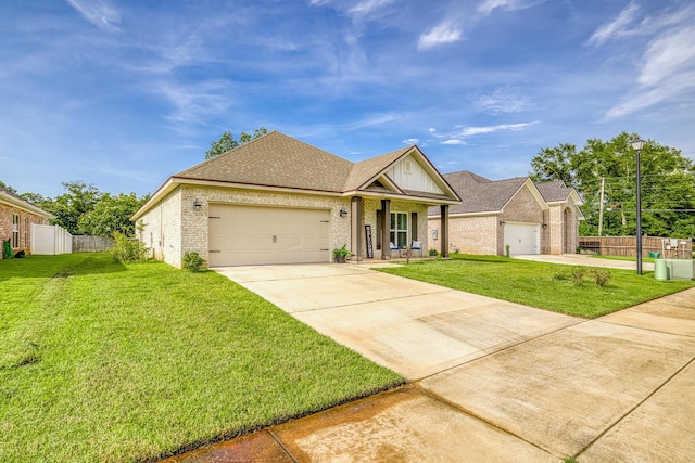 view of front of property with a front lawn and a garage