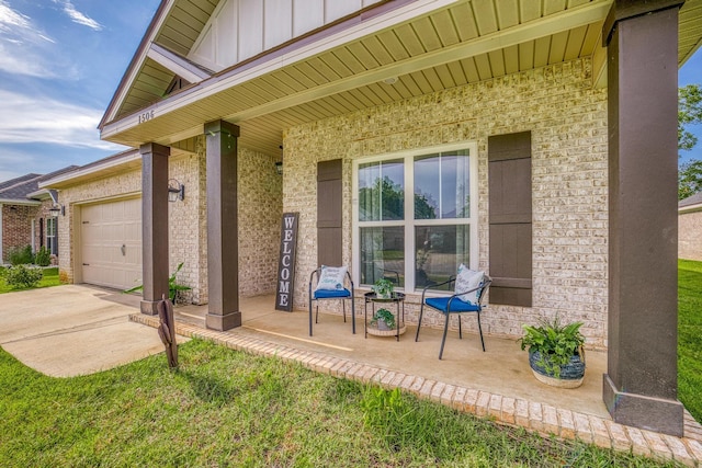 view of exterior entry with a garage