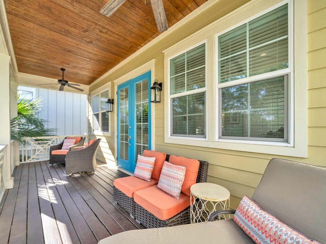 wooden deck with ceiling fan