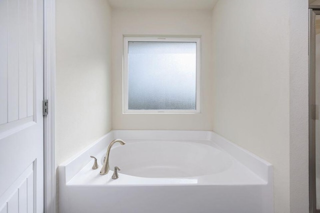 bathroom with a bath