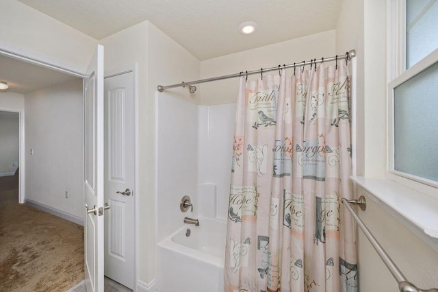 bathroom featuring shower / bath combination with curtain