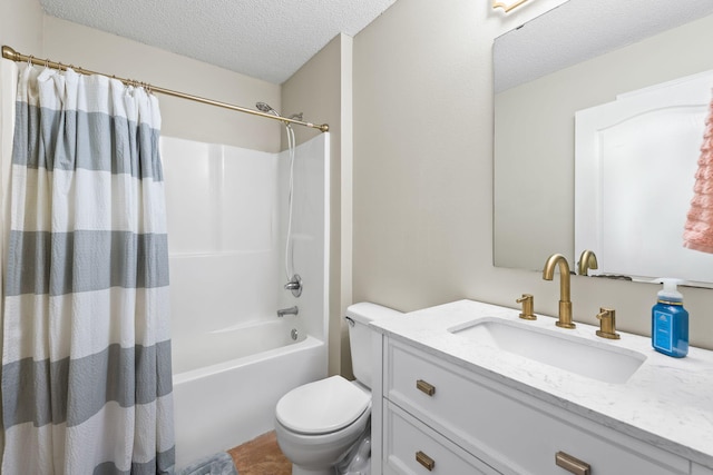 full bathroom featuring vanity, toilet, a textured ceiling, and shower / tub combo with curtain