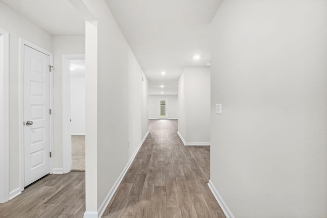 hall featuring light hardwood / wood-style flooring