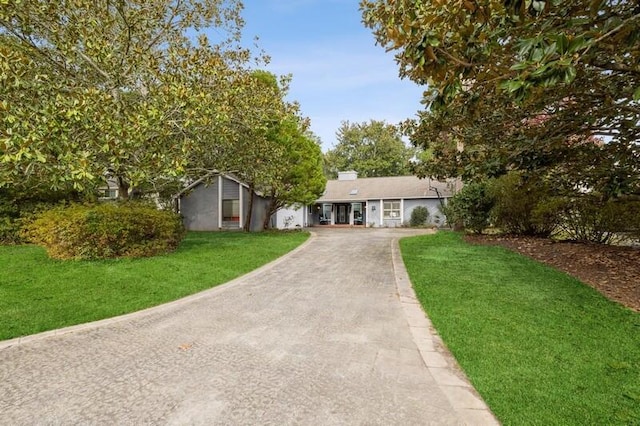 view of front of house with a front yard